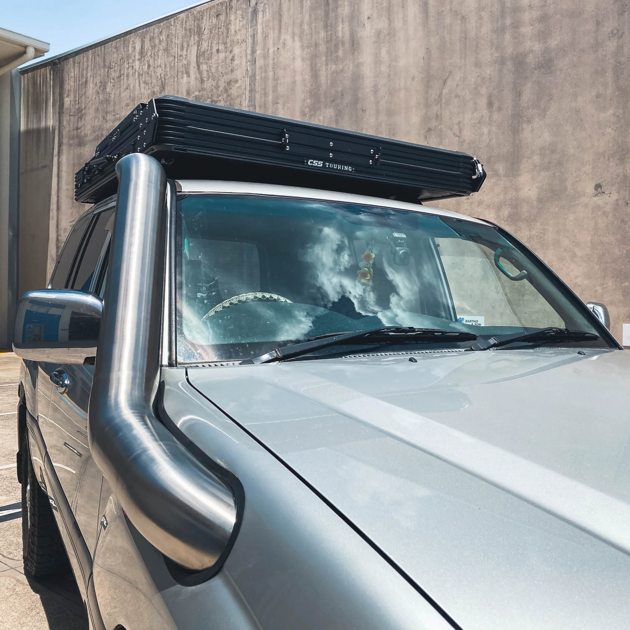 Angry Arc 100/105 Series snorkel mounted along the guard