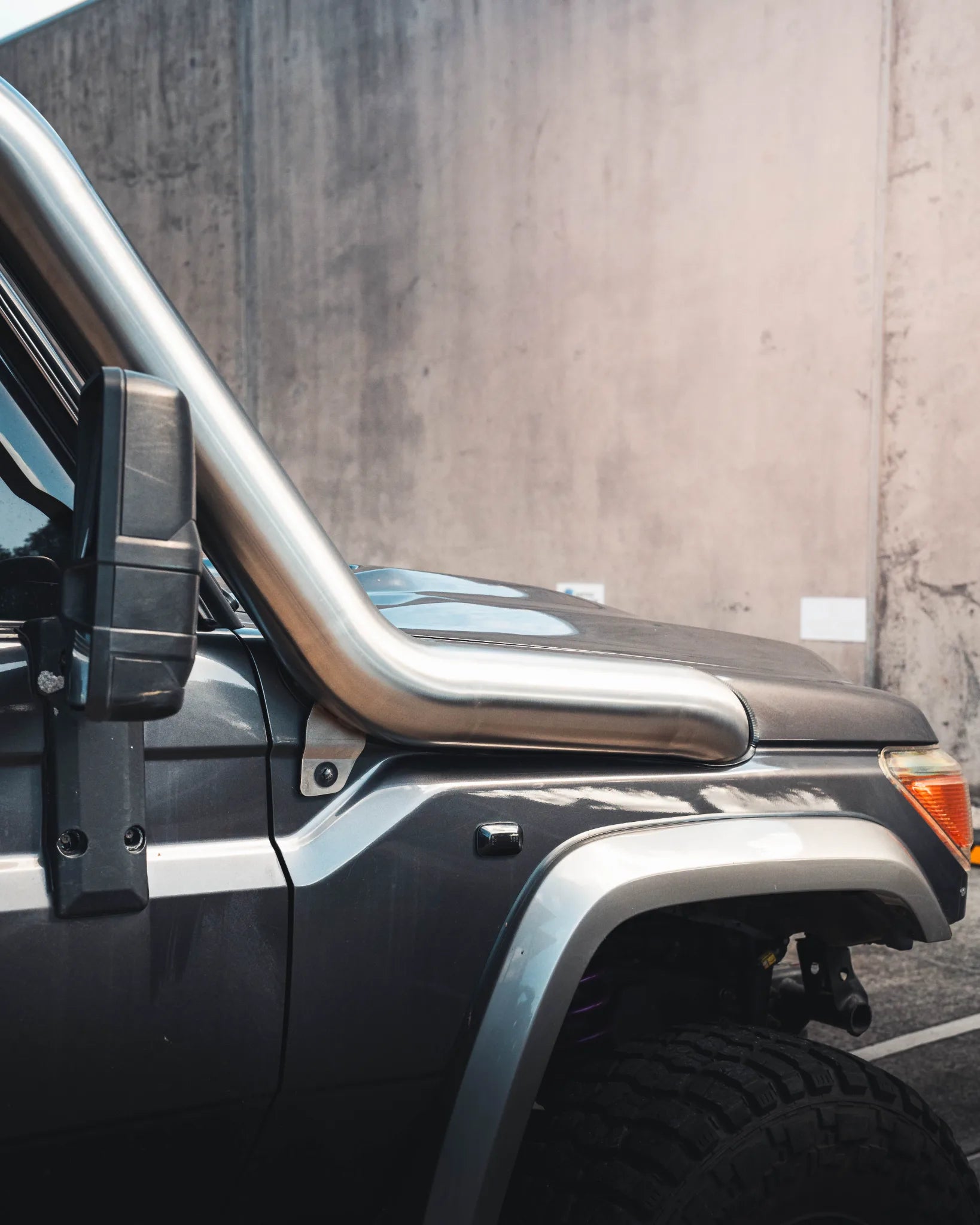 Toyota Landcruiser 70 Series V8 fitted with the Angry Arc 5-inch snorkel, side view